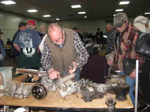 Captain of Industry examines parts at the Swap Meet