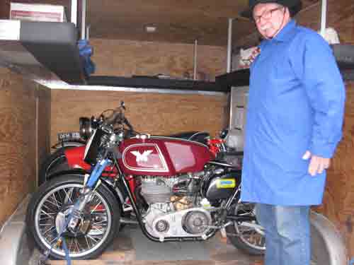 Fred, the Captain of Industry, oversees the loading of his trailer.