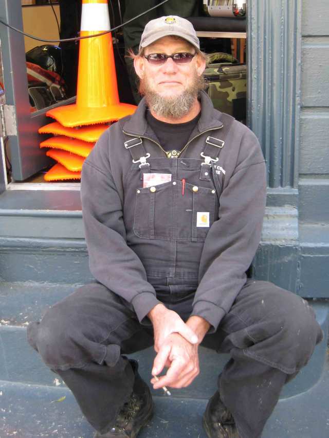 My favorite rebel biker hanging out on the fringes  of the main event