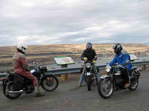 My ride partners, Jeff S. Jeff W. and Fred check their lights.  The Columbia River gorge is behind them.