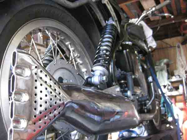 The shiny new muffler on Jeff's Velocette Venom 