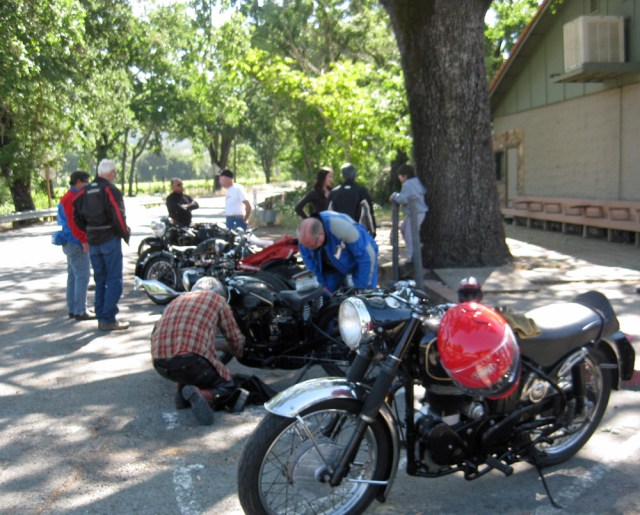 At the first stop, riders check their bikes