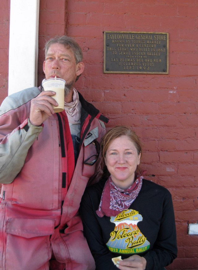 eff Scott and Amy with a coffee shake. Note the sign
