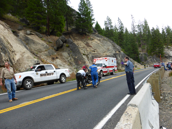 After a lot of wrestling, the guys were able to roll the bike to a wide space on the shoulder of the road.